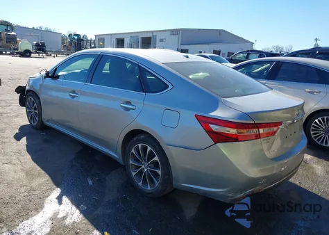 2018 Toyota Avalon Hybrid Xle z USA, uszkodzony, nr VIN 4T1BD1EB9JU063875